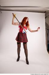 TINA STANDING POSE WITH SWORD